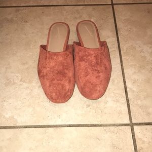 Burnt orange slip on mules
